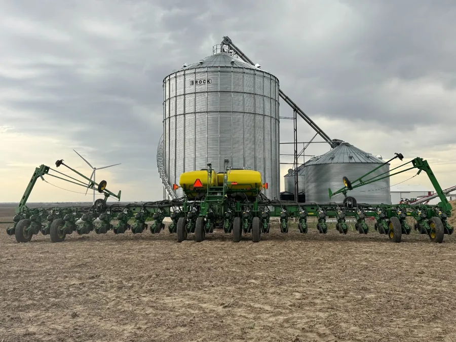 Planter in front of grain bins
